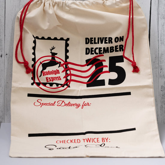 Christmas Gift Bags | Reusable Oversized Fabric with Drawstring Cord - Deliver on December 25 Logo - Alicia GonzalezGift Bags