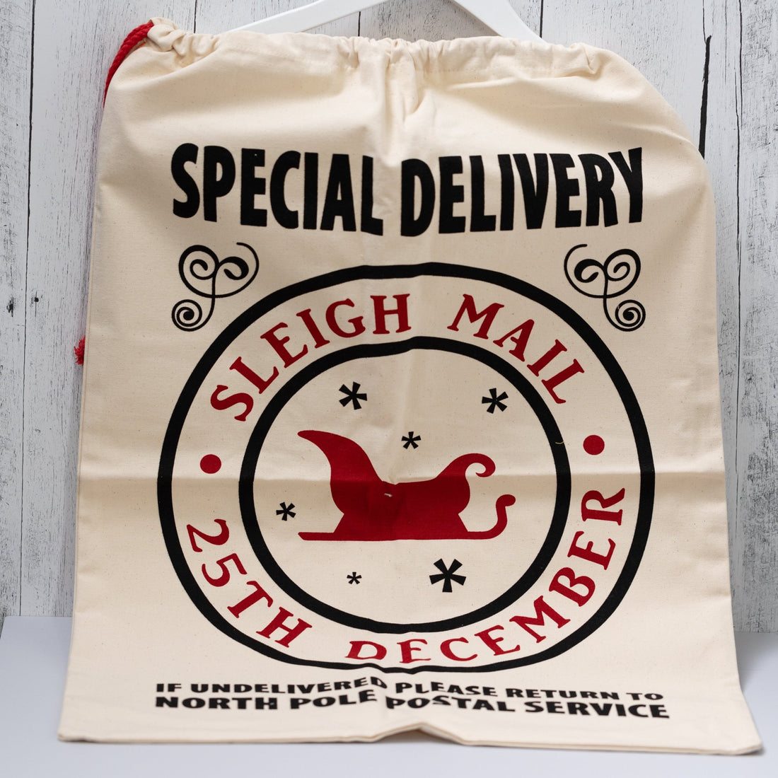 Christmas Gift Bags | Reusable Oversized Fabric with Drawstring Cord - Special Delivery Sleigh Mail Logo - Alicia GonzalezGift Bags